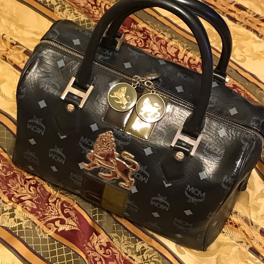 mcm boston purse in fair condition